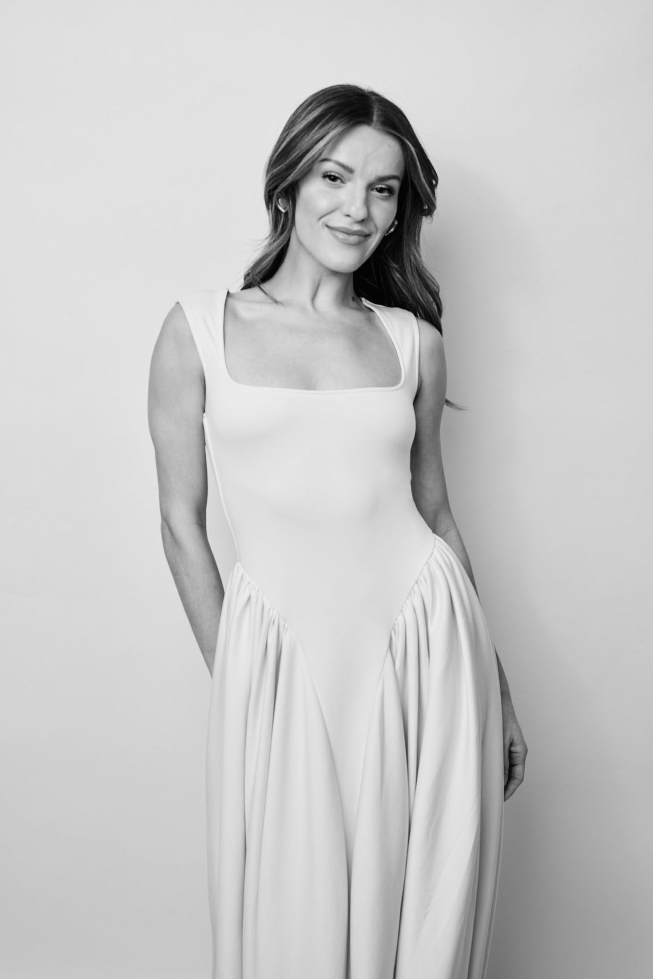 Portrait by Studio JK Photography — woman in white gown, editorial black-and-white